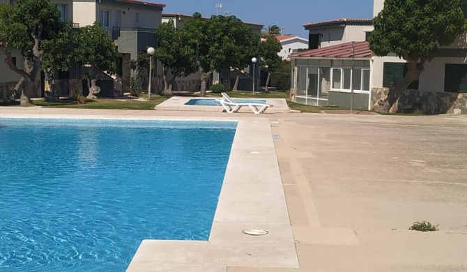 Apartamento con piscina, Cala en Blanes Ciutadella